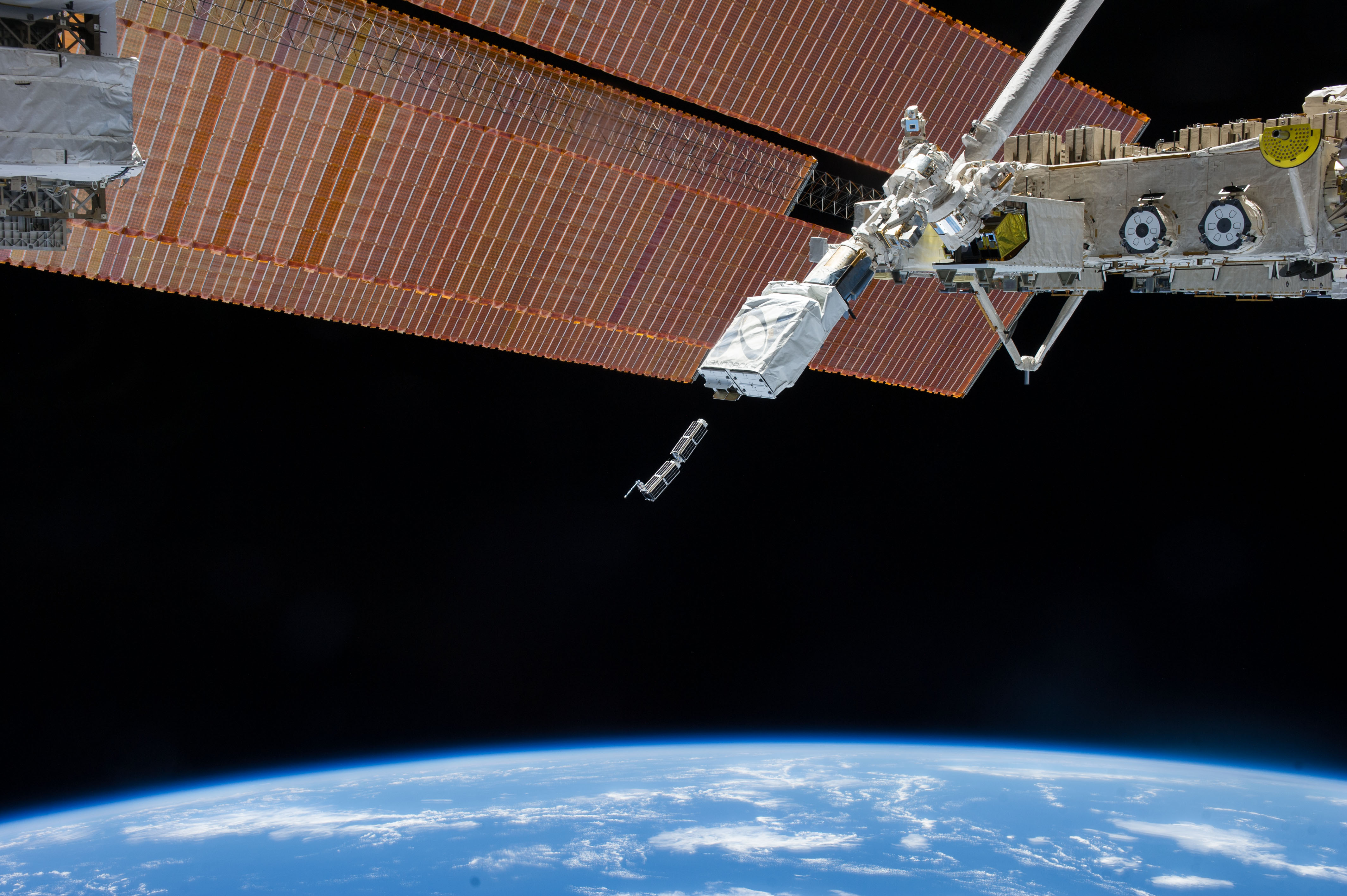 CubeSats being deployed from the ISS on February 11, 2014