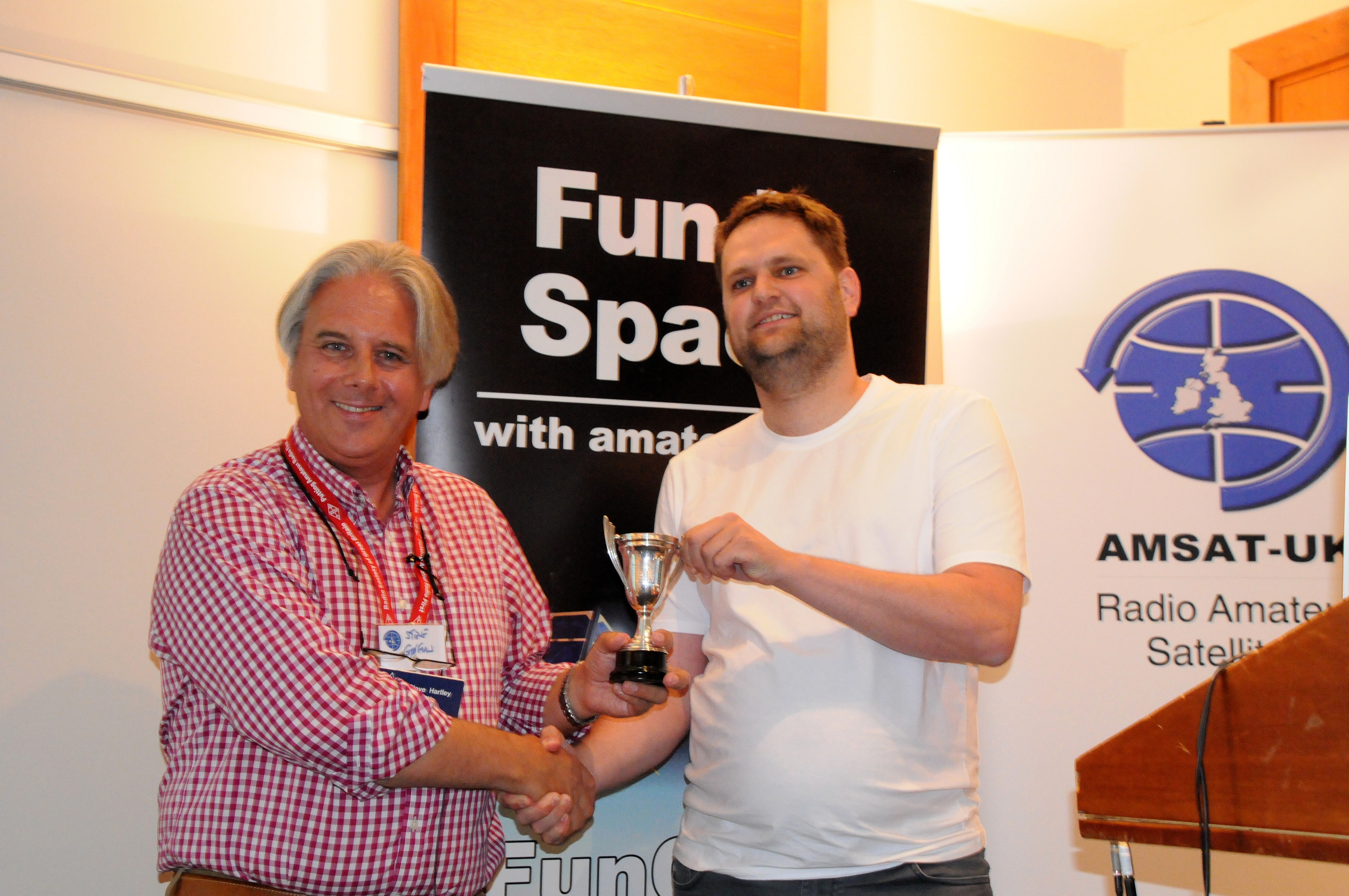 Steve Hartley G0FUW presents the Louis Varney Cup to Wouter Weggelaar PA3WEG - Credit Mike Rupprecht DK3WN