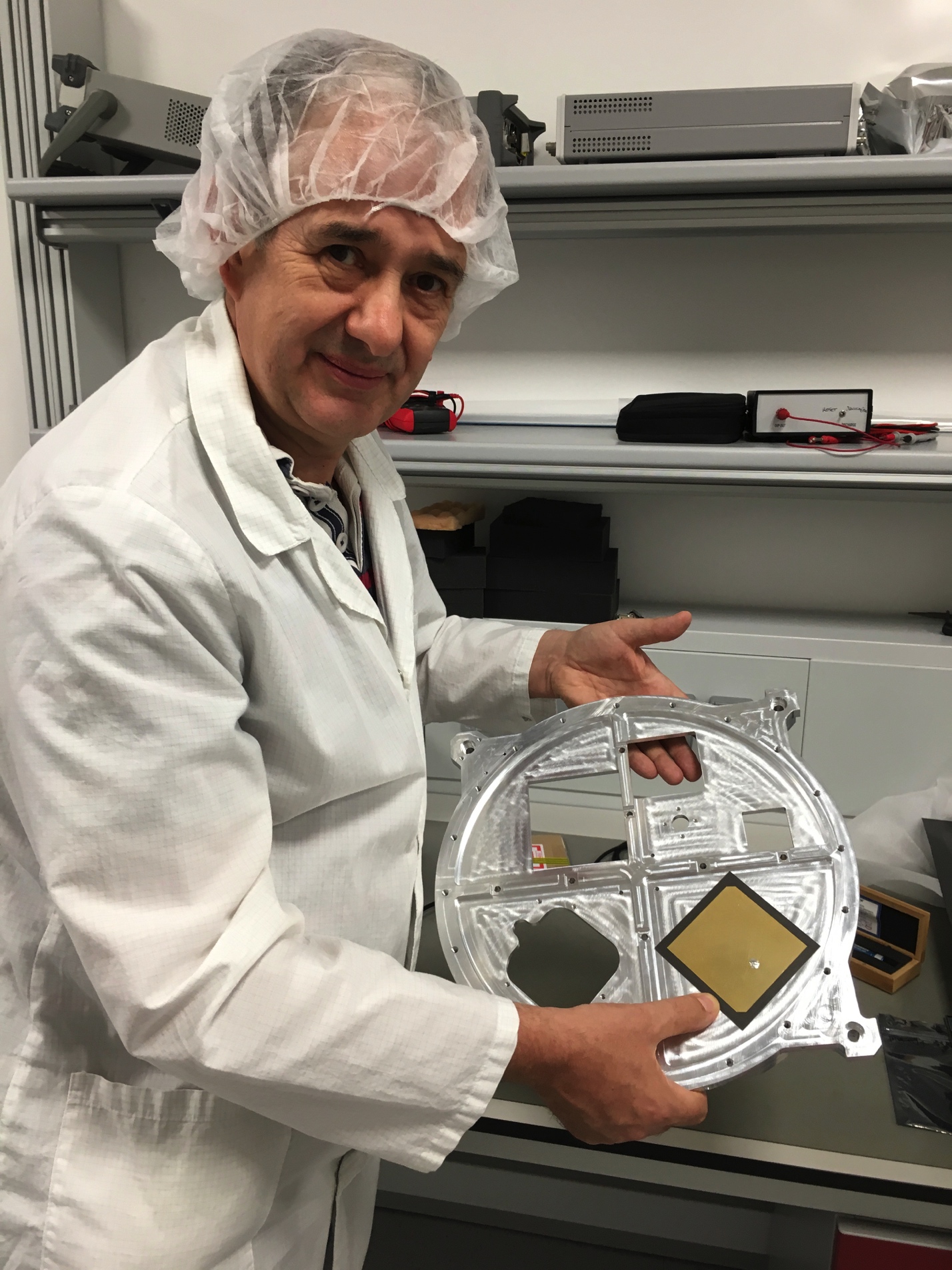 David Bowman G0MRF holds the ESEO bottom plate during the fit check of the L band patch antenna