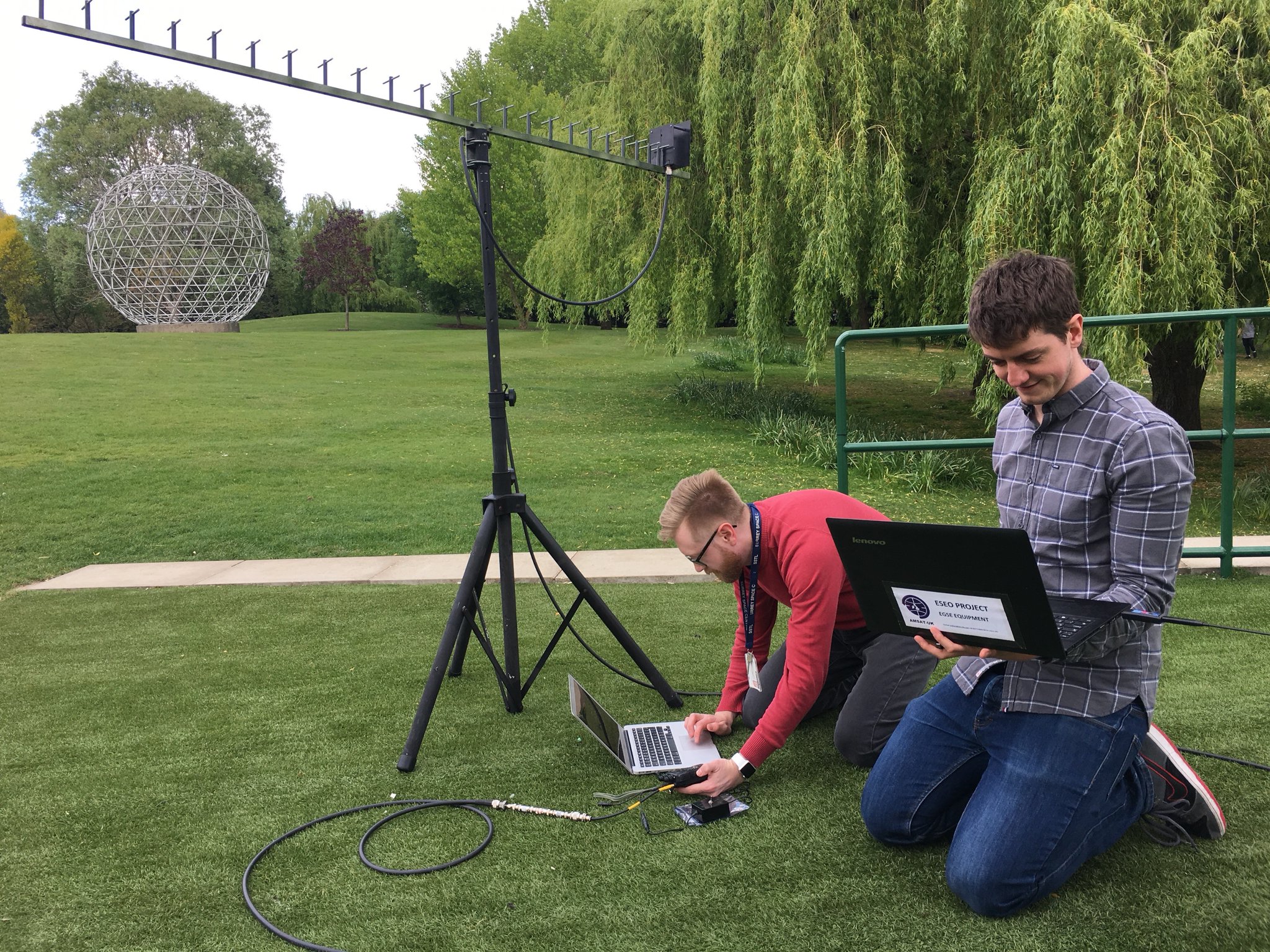 Dr Chris Bridges M0IEB and Pete Bartram conduct uplink command testing on the ESEO payload in the grounds of University of Surrey